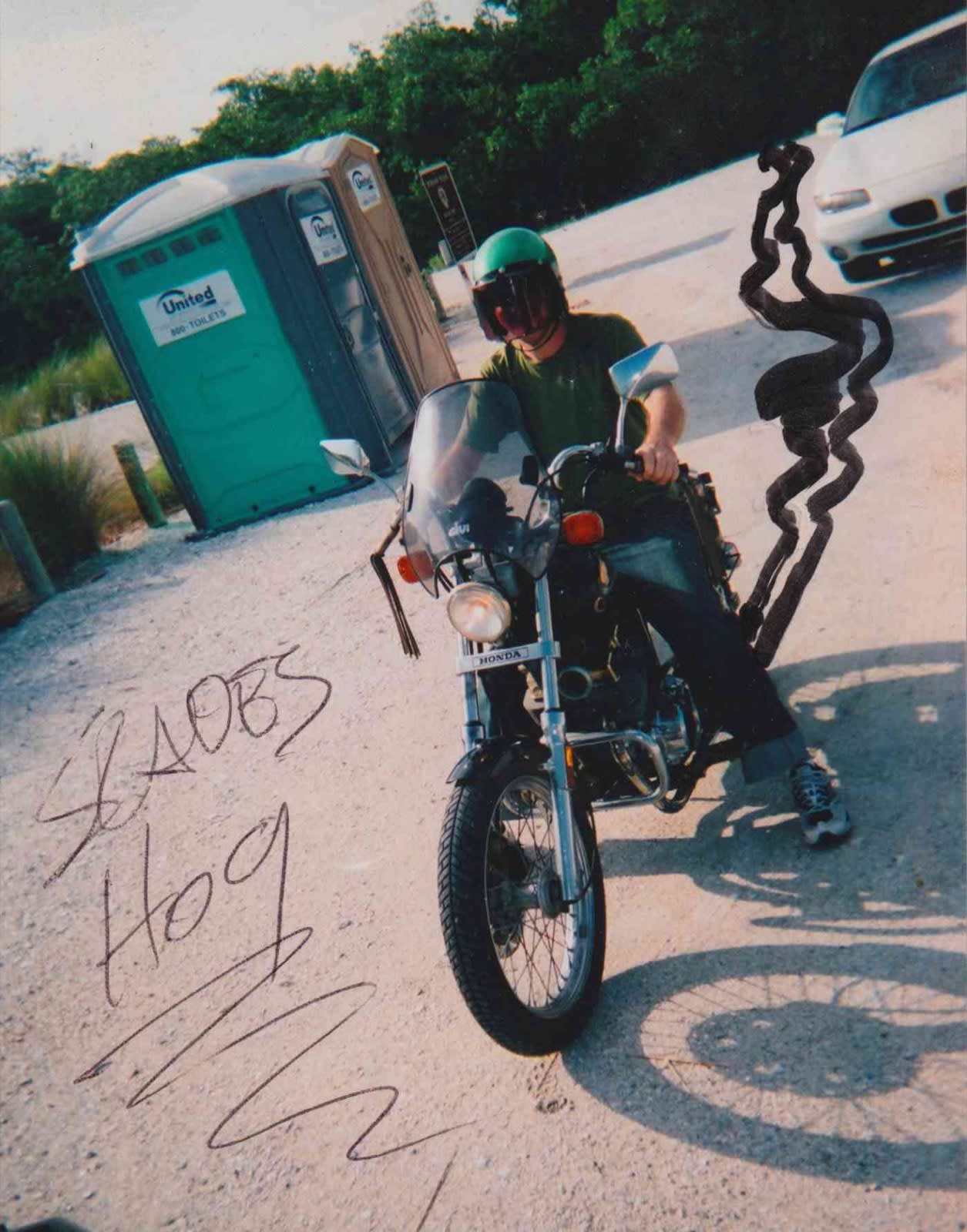 Slade's Hog Slade's Hog: Slade Nash on a motorcycle