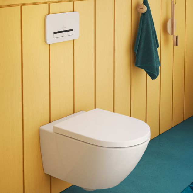 Lille lyst toilet med et Subway toilet fra Villeroy & Boch