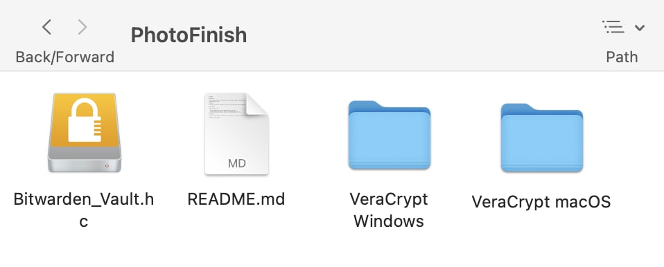 The encrypted volume (Bitwarden_vault.hc) appears alongside non-encrypted files on the PhotoFinish USB drive
