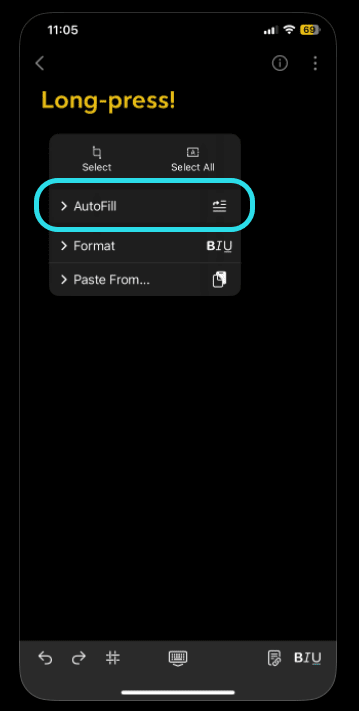 Long-press a text field on iOS