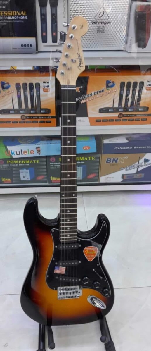 Fender Rythmn Stratocaster-style electric guitar in a sunburst finish