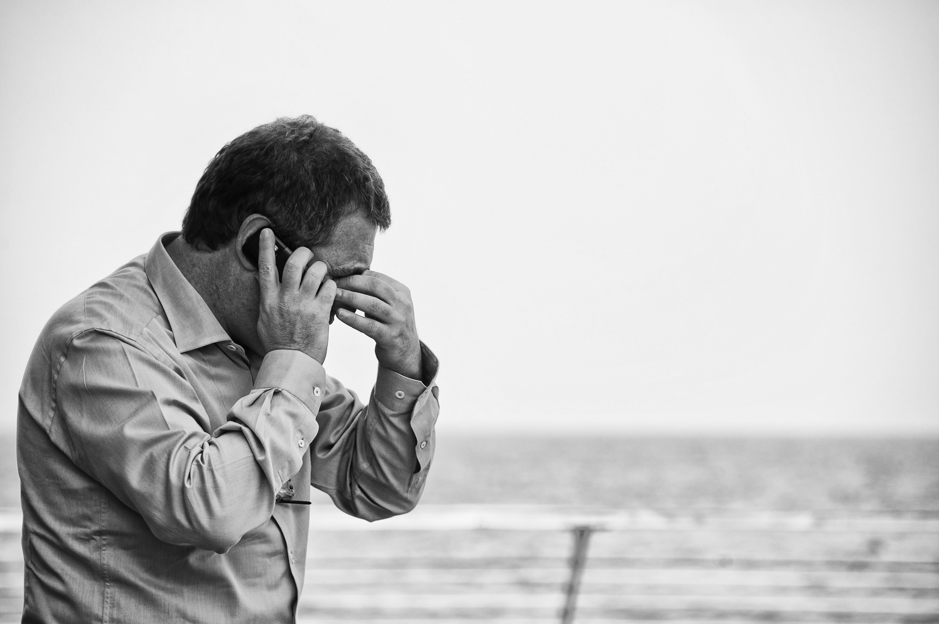 Stressed man on phone Stressed man on phone