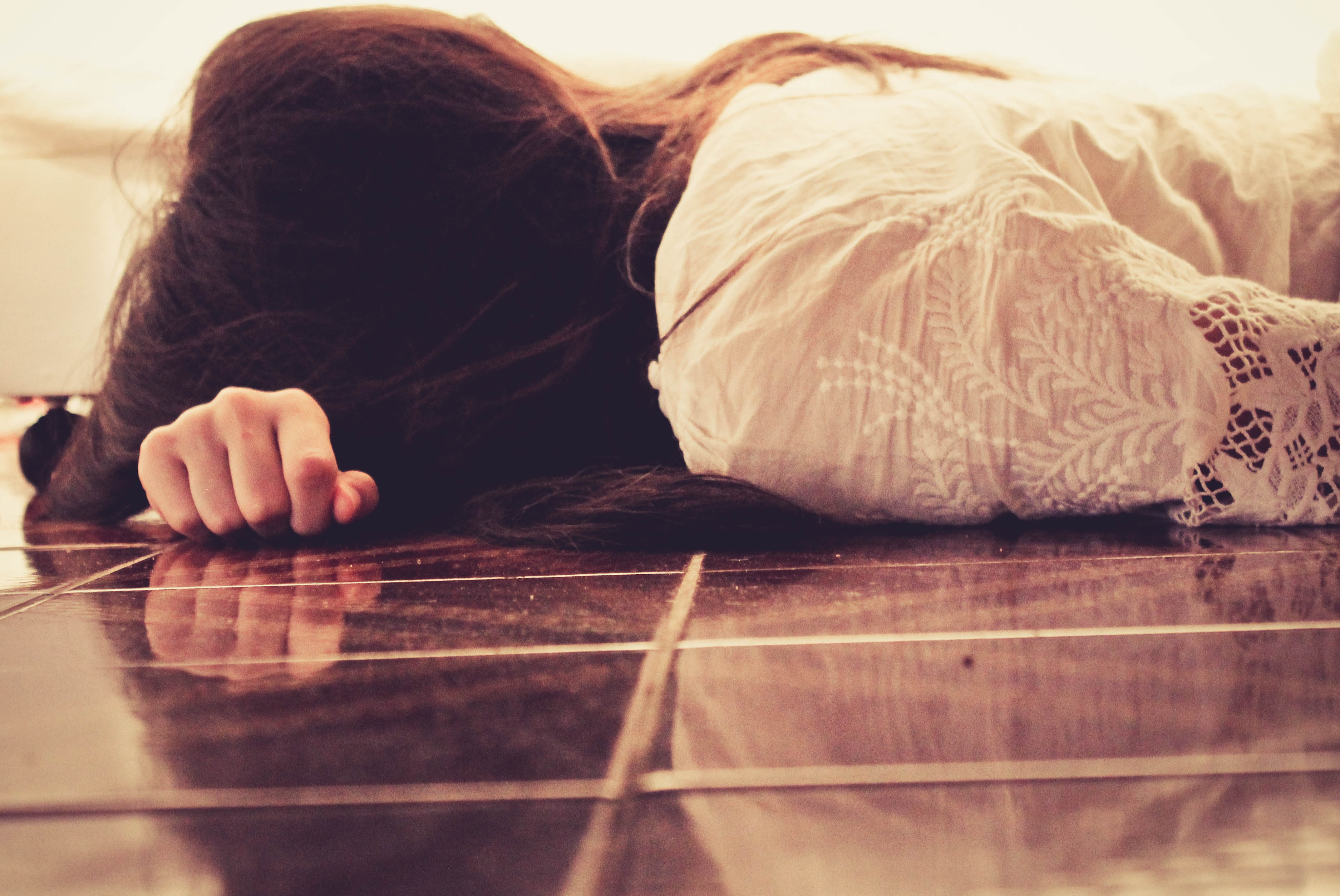 Suicidal lady on floor Suicidal lady on floor