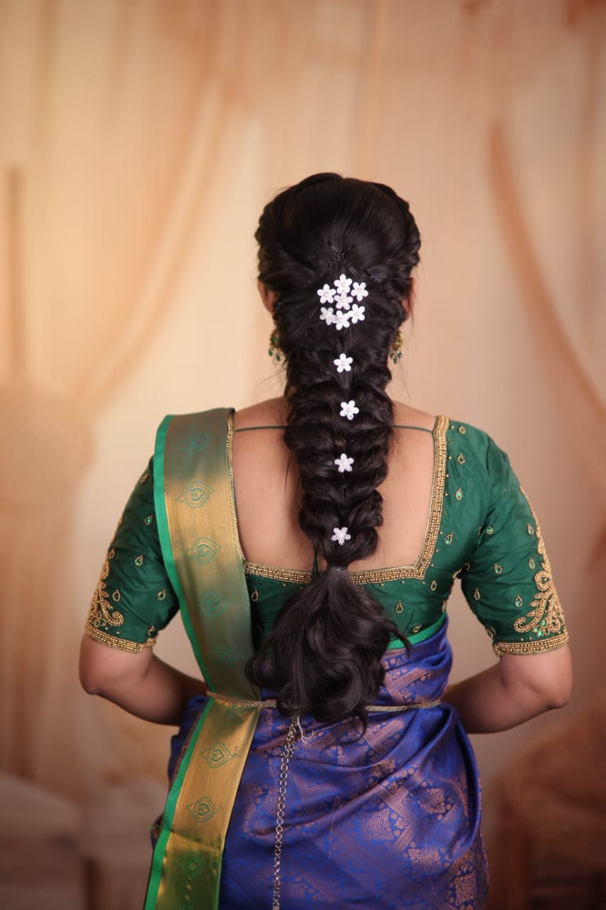 Bridal hair with extensions blended into a braided style in Chennai