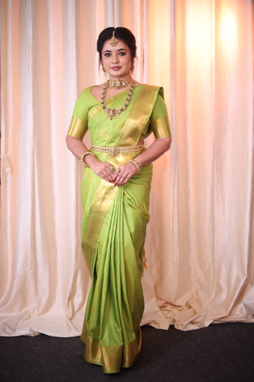 Bridal styling in Chennai — bride in a green Kanjivaram silk saree with professional draping and jewellery