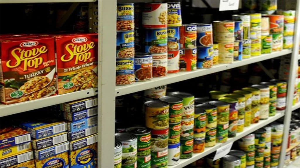Shelves stocked with groceries at the Northern Hills Food Pantry