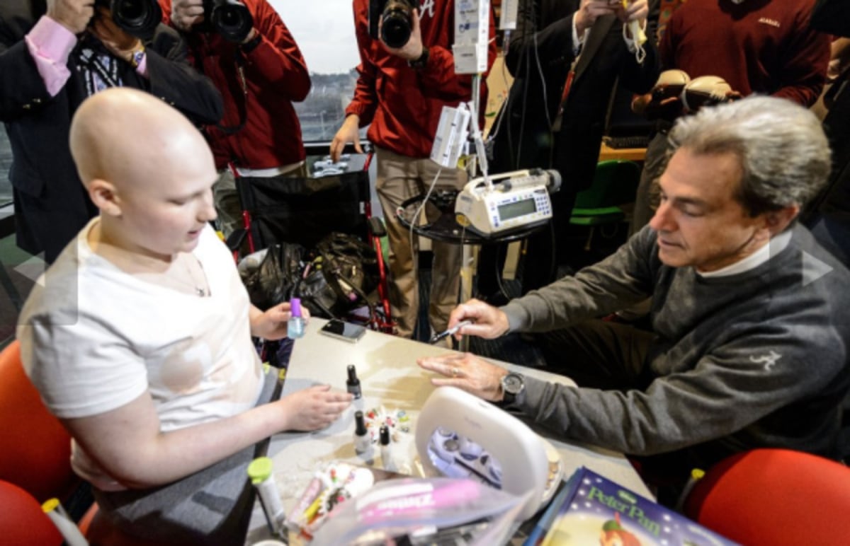 Nick Saban Gets Nails Painted by 12 Year Old Gabrielle Nave at Children's Hospital