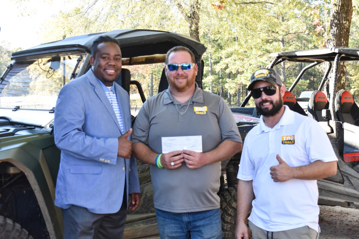 Top Trails Gives Christmas on the Square Donation