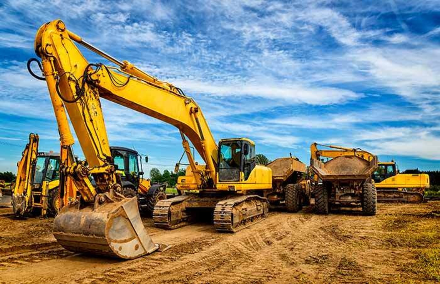 Construction site with cranes and machinery