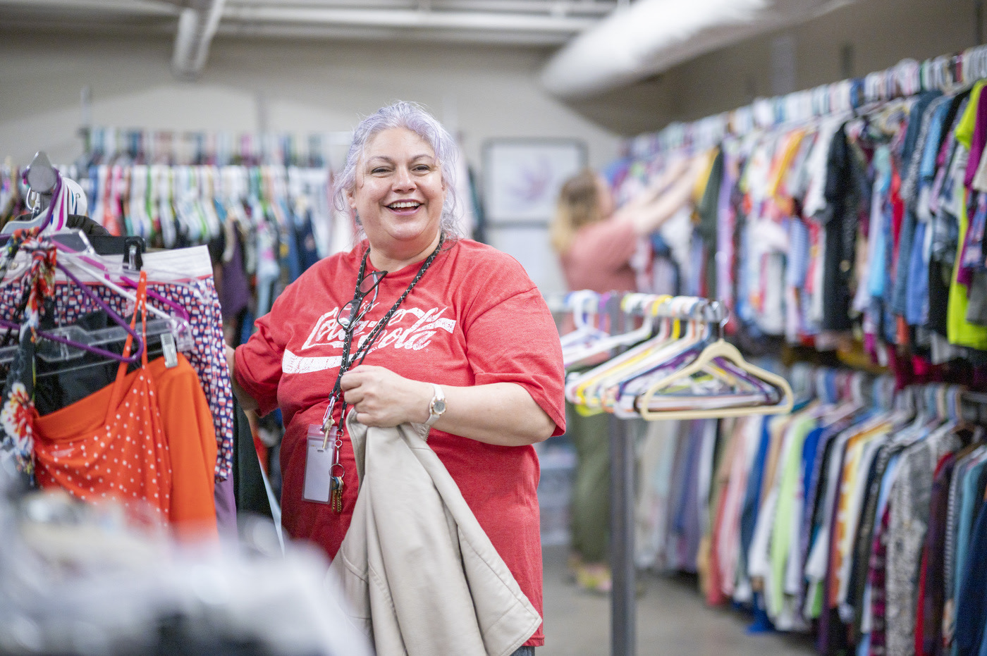 Woman sorting through clothes
