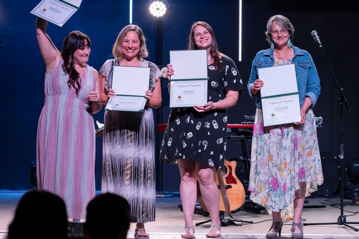Women celebrating at a graduation