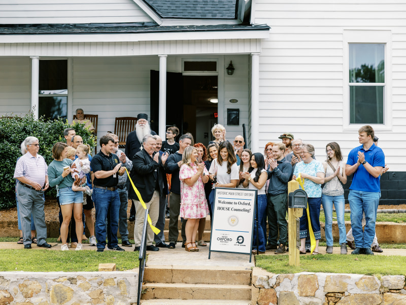 House Counseling cuts ribbon on new Choccolocco Street location