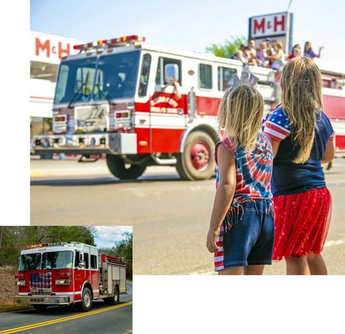 Girls looking at Firetruck