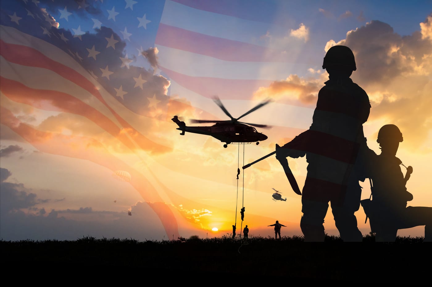  Solider's silhouette with a sunset and American flag  