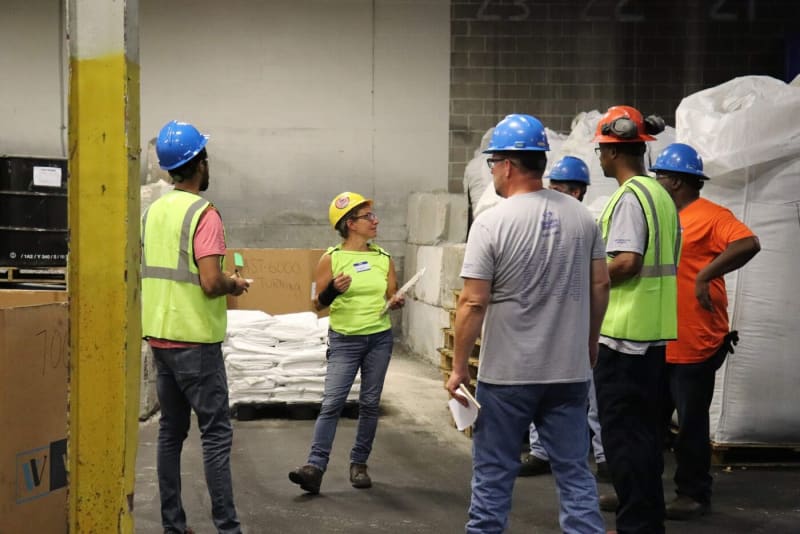 Group of people in hard hats