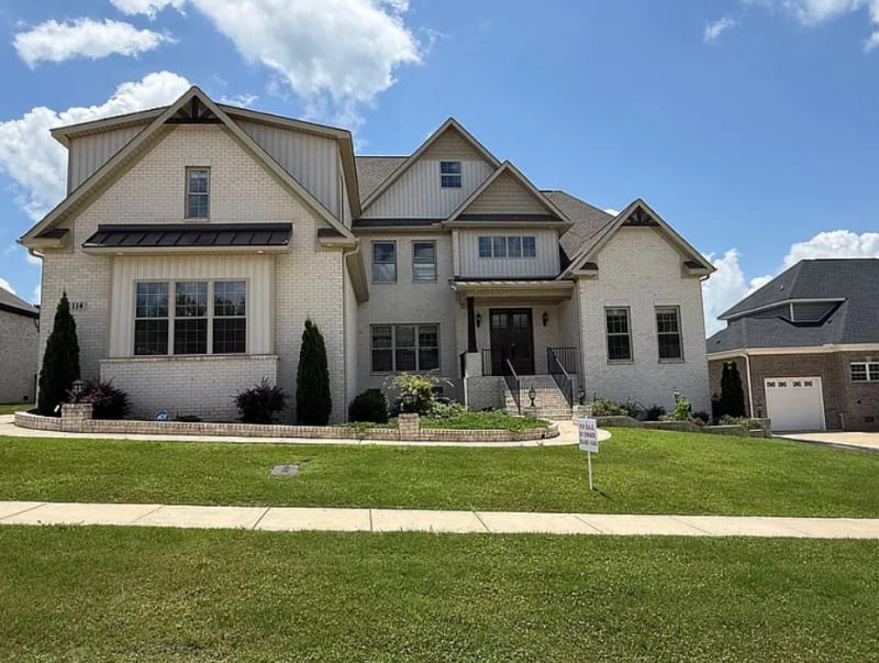 Exterior view of a home currently available for sale. Select to view property details.