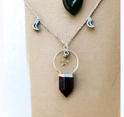 Colgante de plata 925 con lunas, estrellas y onix