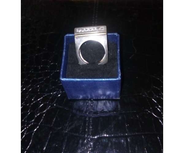 Anillo plata y oro con incrustaciones de piedra aquamarina
