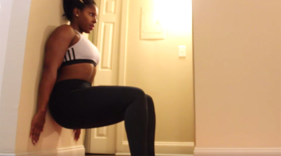 Press your back on the wall as much as you can and into your heels. Hold that position for 30 seconds or as long as you can hold.