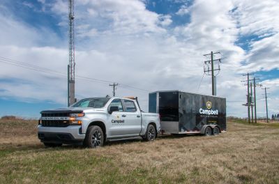 Maintenance truck and trailer at field visit