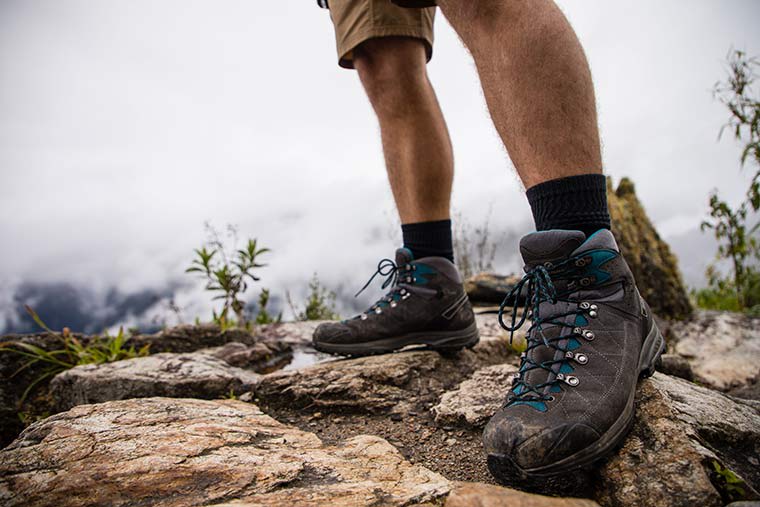 Close up of a hiker wearing the Kailash Trek GTX Hiking Boot