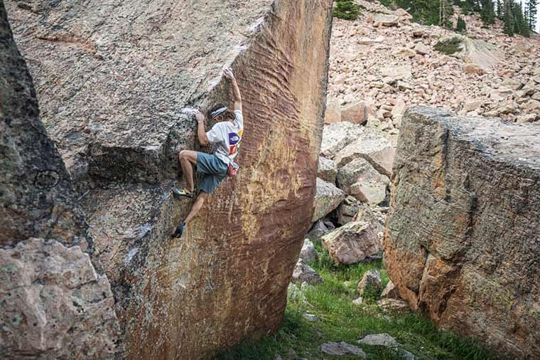 Climber wearing the SCARPA Drago Climbing Shoe while bouldering