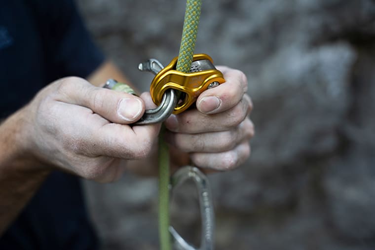 The Wild Country Ropeman 2 with a locking carabiner being attached.