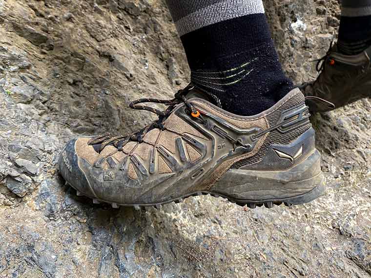 Close up of the Switchfit system being used while climbing a rock slab