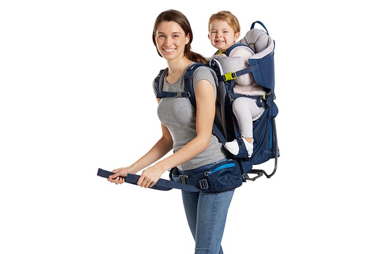 woman carrying a child in a Deuter Kid Comfort pack