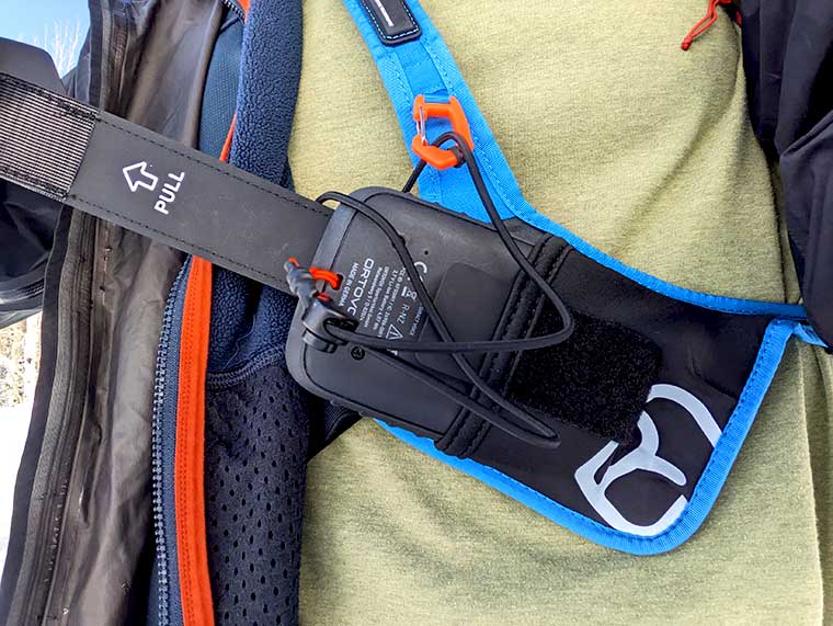 Close up of the Ortovox Diract chest harness and pull strap.