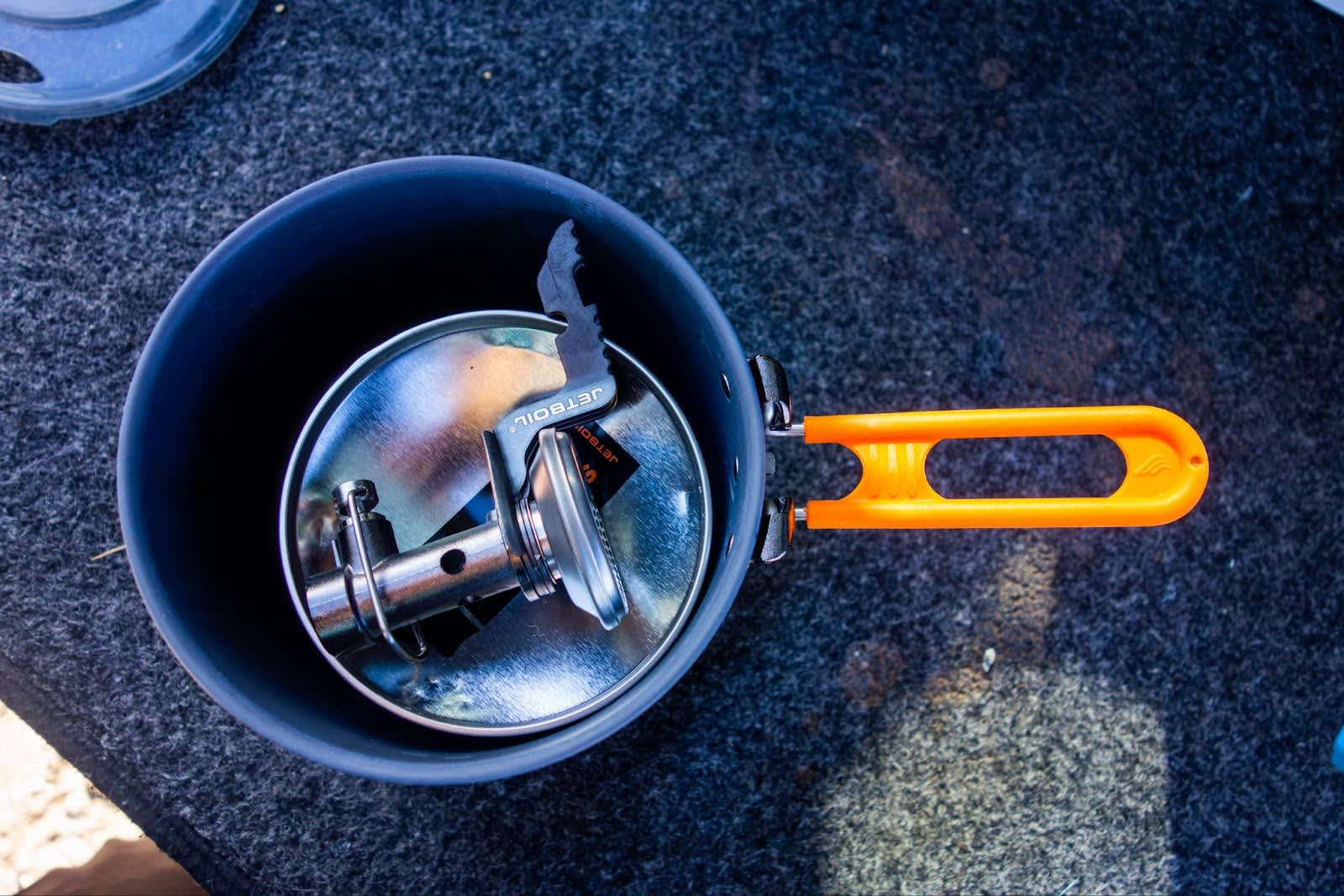 Top down view showing that the Stash can hold a fuel can and regulator in the cook pot