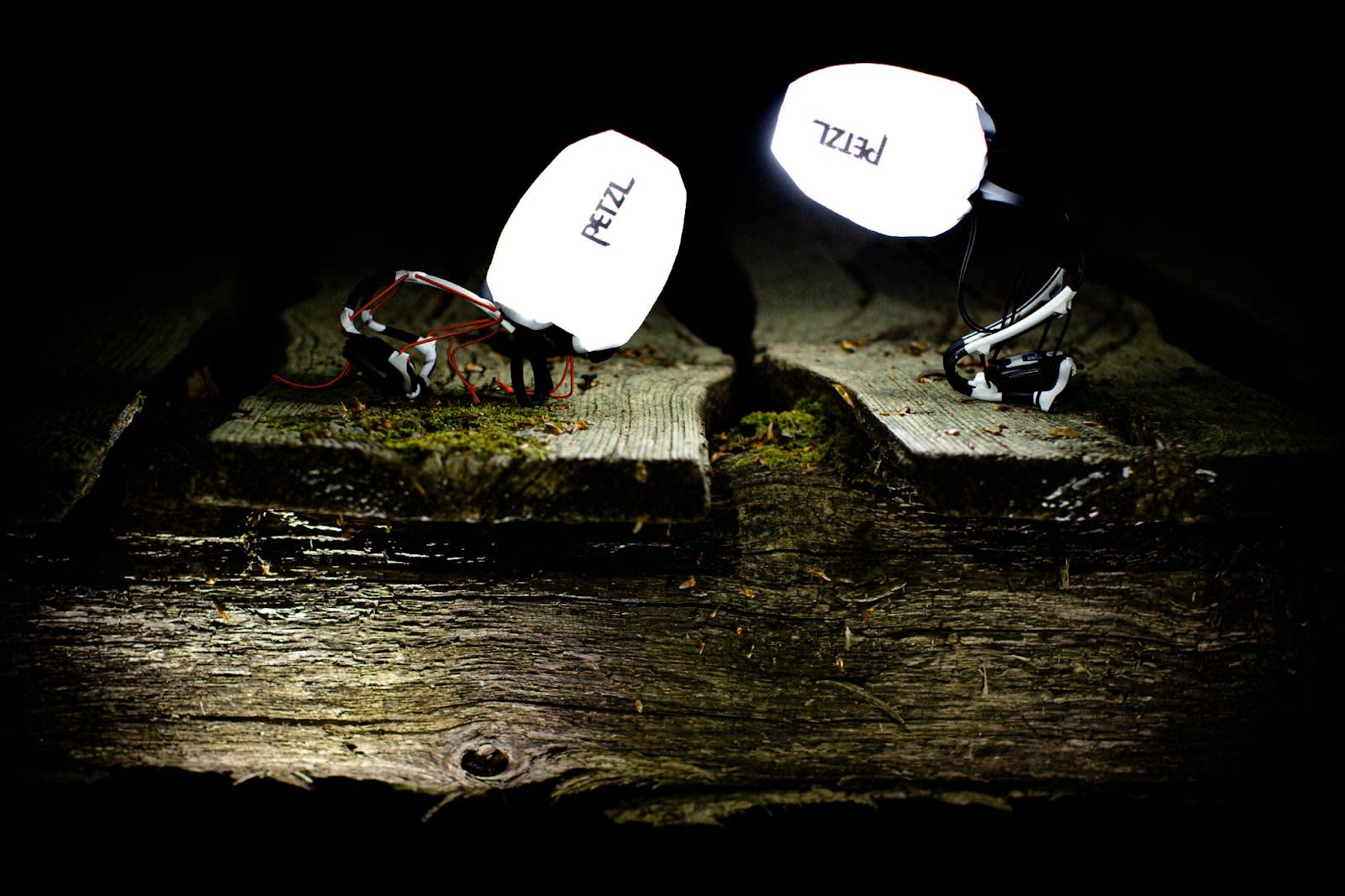 Two IKO CORE headlamps inside of the included SHELL LT pouch for use as lanterns