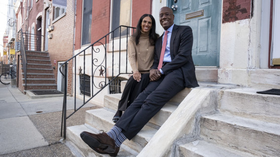 President Wingard and wife Gingi pictured sitting on steps