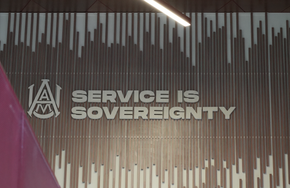 A sign on AAMU's campus that reads, "Service is Sovereignty"