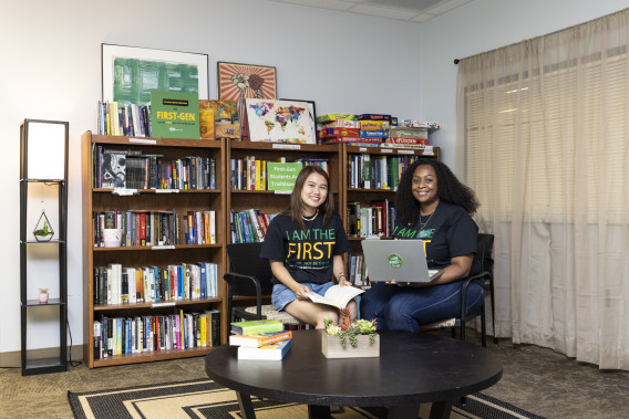 Assistant Director First-Generation Student Support Nakia Waters and student sit together in the First-Gen+ Resources Center