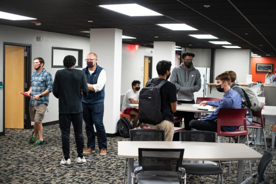 Students meet in the new home for the Apex Center for Entrepreneurship, which is above PK's Bar & Grill in Blacksburg. For the second year, Virginia Tech has been ranked No. 25 for undergraduate entrepreneurship programs by Princeton Review. Photo by Lee Friesland for Virginia Tech