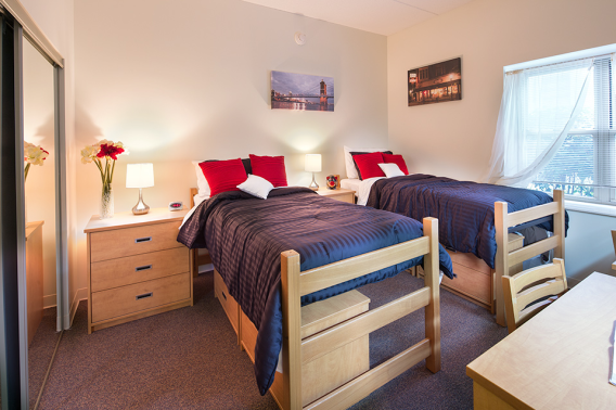 Two beds in a residence hall room