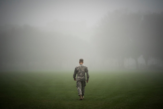 Cadet walks through fog