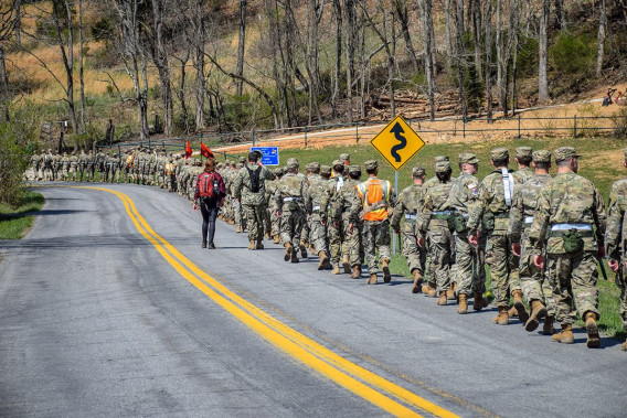 Cadets walk in single-file along a roadway during a 2018 Caldwell March. Shay Barnhart for Virginia Tech.