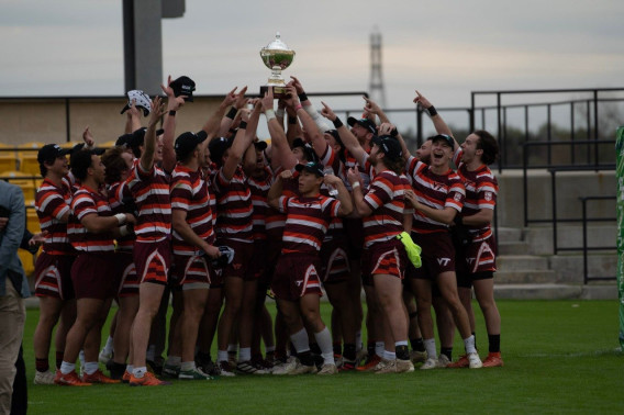 The Virginia Tech men's rugby club team celebrates after winning the Division I-AA Men's Collegiate Rugby Championship in Texas. Photo by Olly Laseinde of @rugbysnapshots.