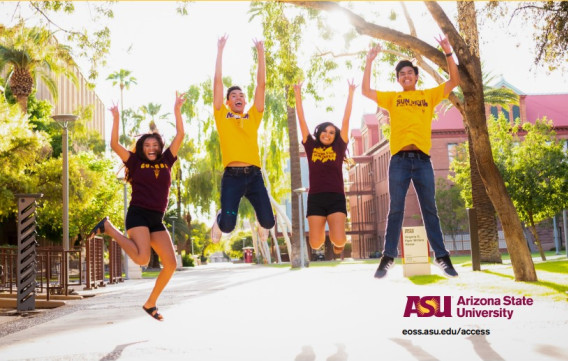 Four ASU students jump in the air.