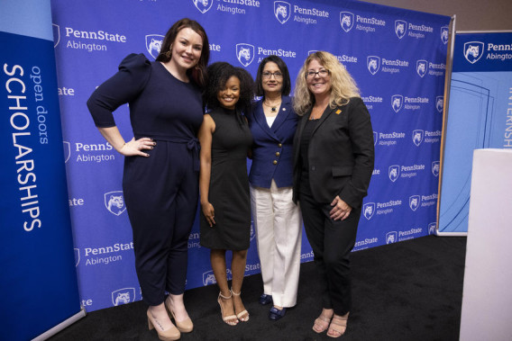 Student speakers Faith Attig and Molaea-Rene Goodman, Penn State President Neeli Bendapudi, and Penn State Abington Chancellor Margo DelliCarpini