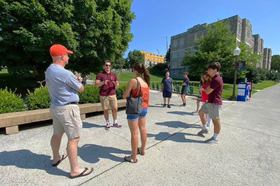 Prospective students and families take a campus tour.