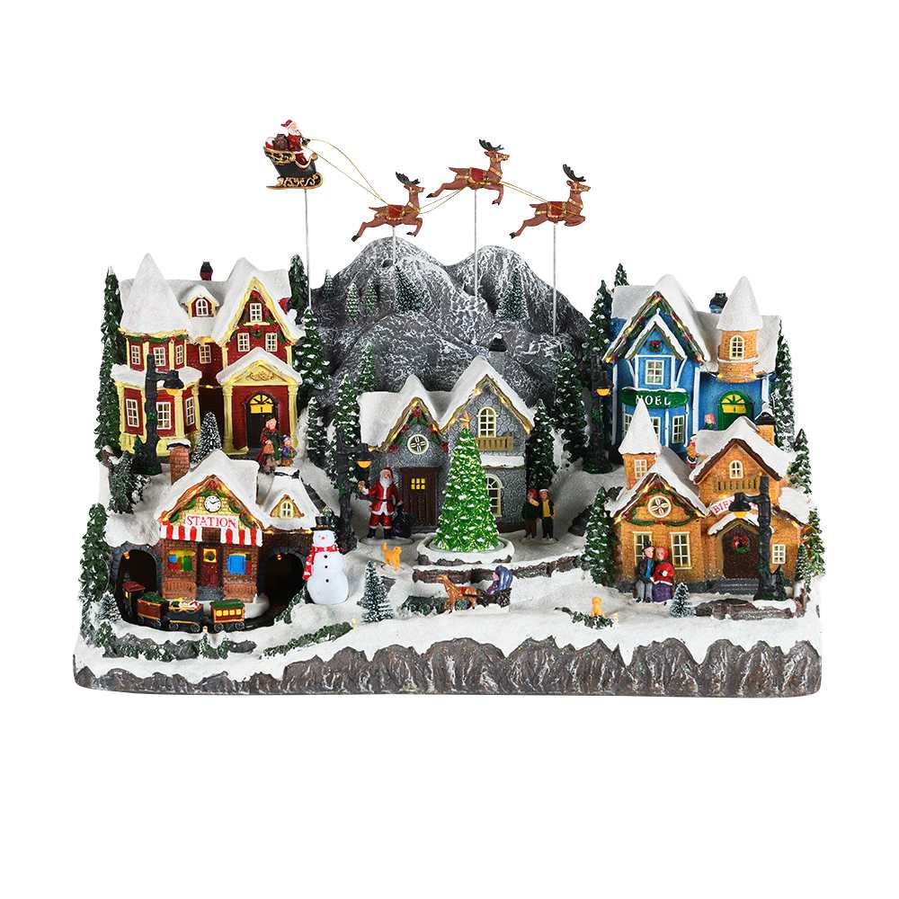 Village avec train musical illuminé