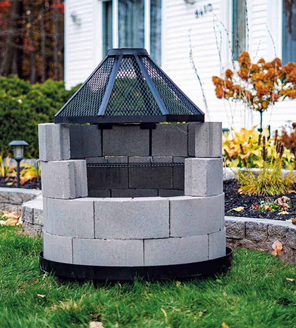 Pare-étincelles pour foyer en blocs de béton