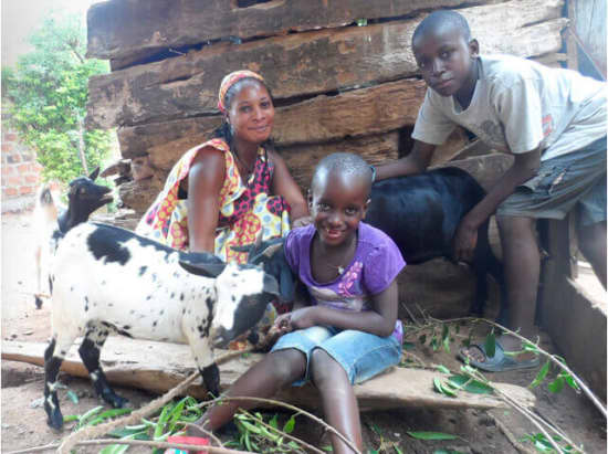 Florence with her family and their goats