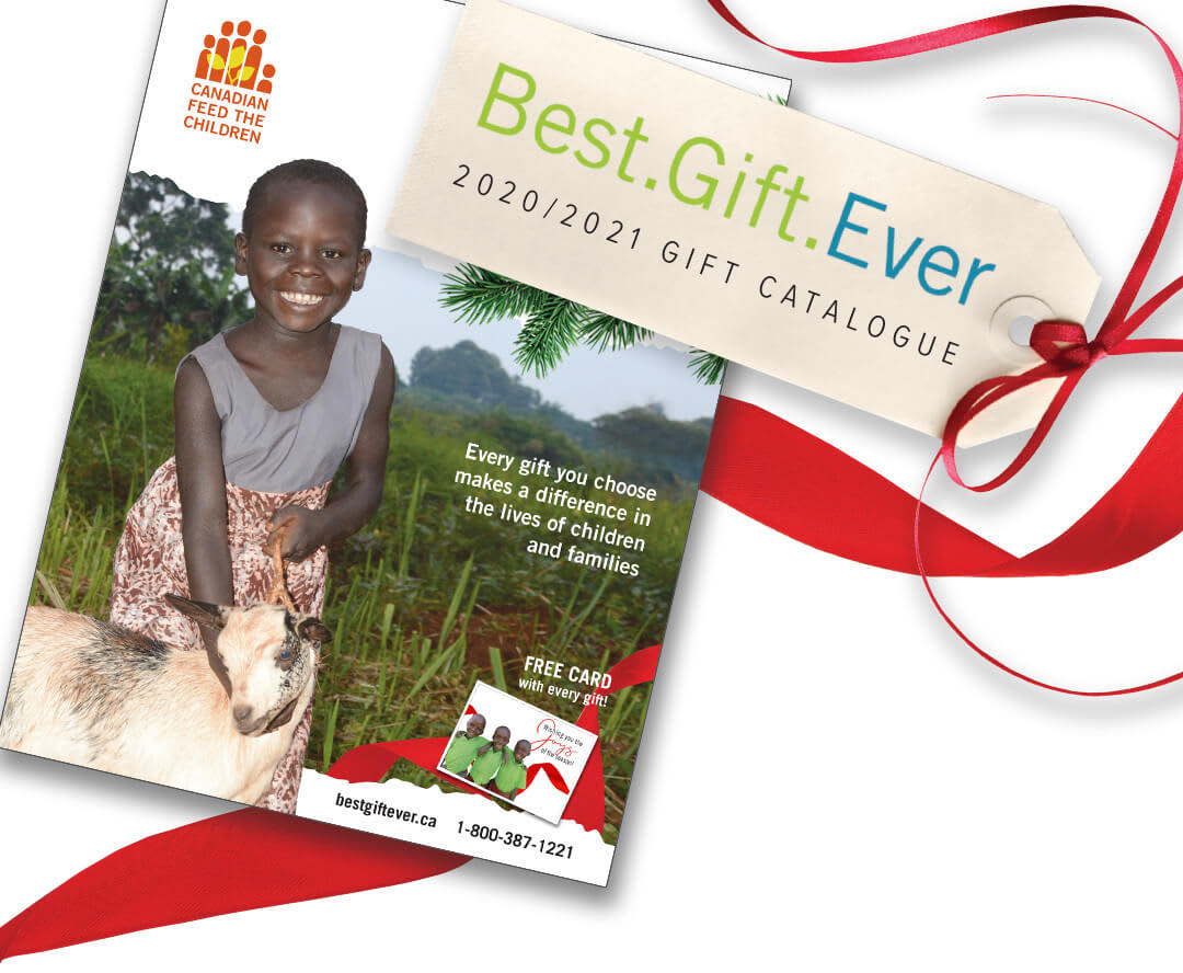 Abiriya on the cover of the 2020/2021 Best.Gift.Ever catalogue holding one of her families goats