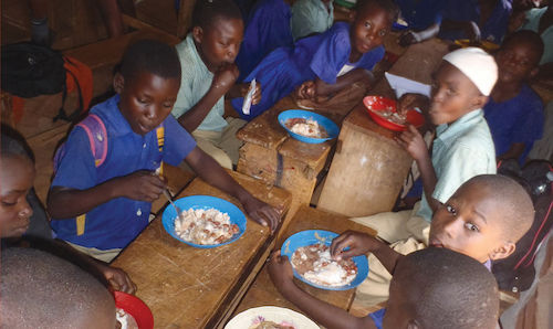 African school children eating lunch