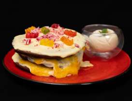 Новорічно-Різдвяне "Крінжове Меню": Панкейки № 14 з мандариново-імбирним джемом кремом Сабайон та домашнім морозивом