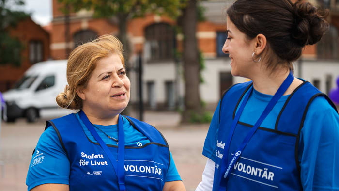 Två volontärer under Stafett för Livet